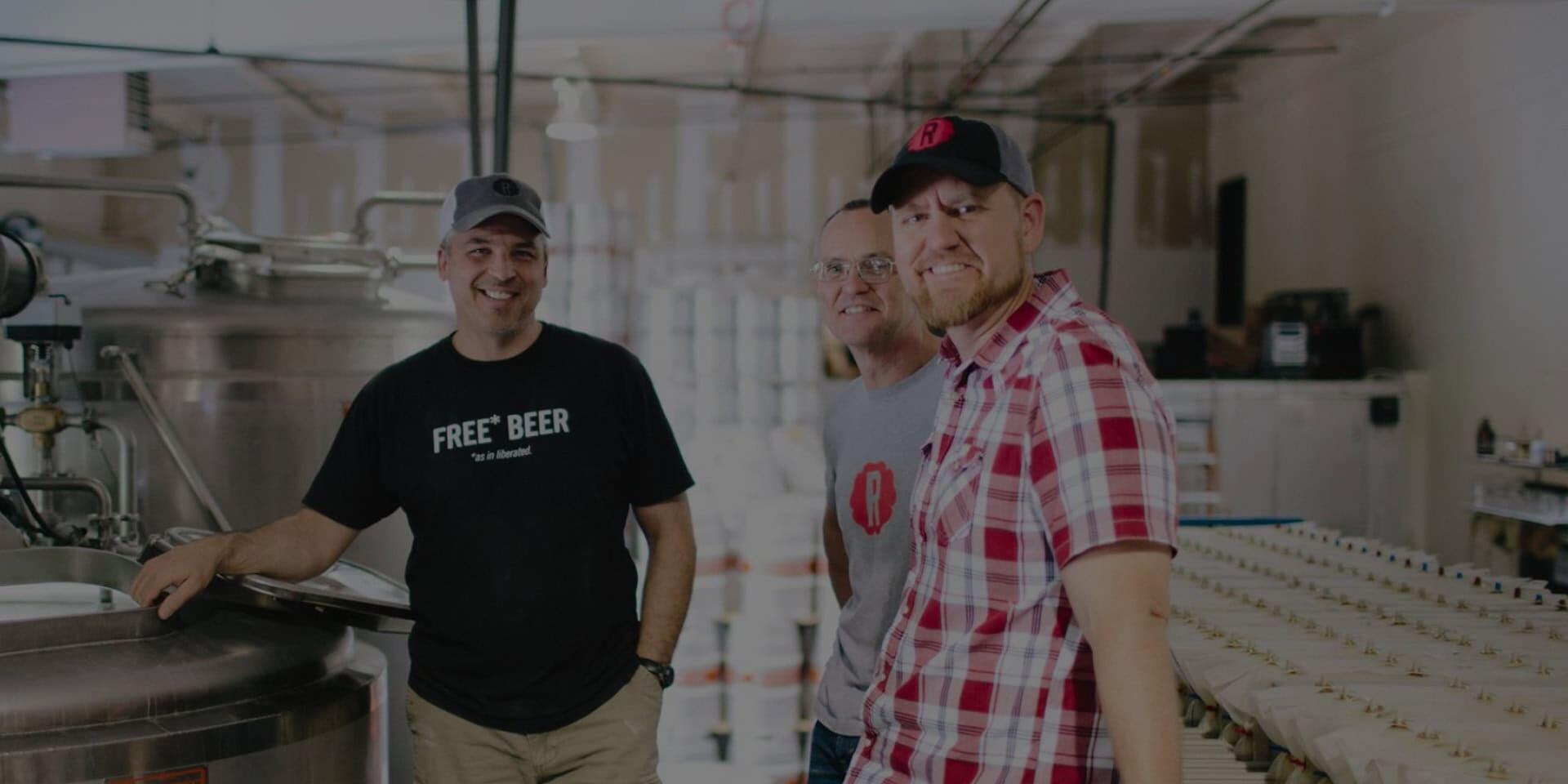 Spencer and the Reformation crew in the brewhouse